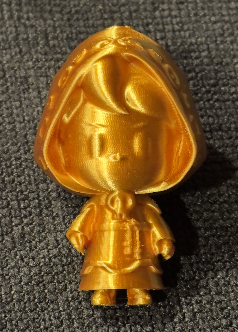 BixbyBig gold figurine of Bixby the necromancer from WordMaxed